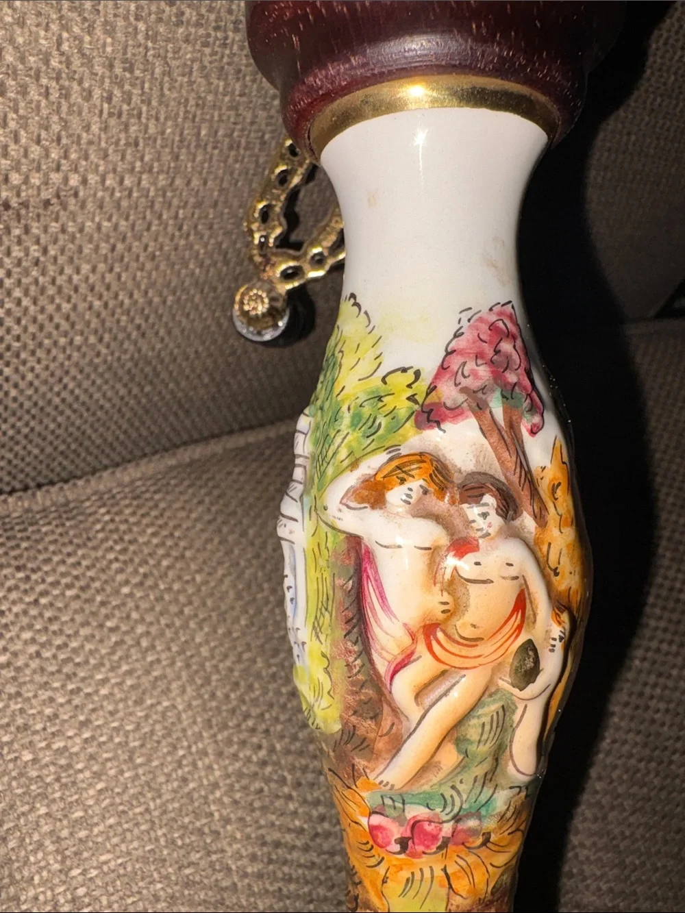 Rare find vintage Capodimonte musical pepper grinder.  Porcelain brass & wood.